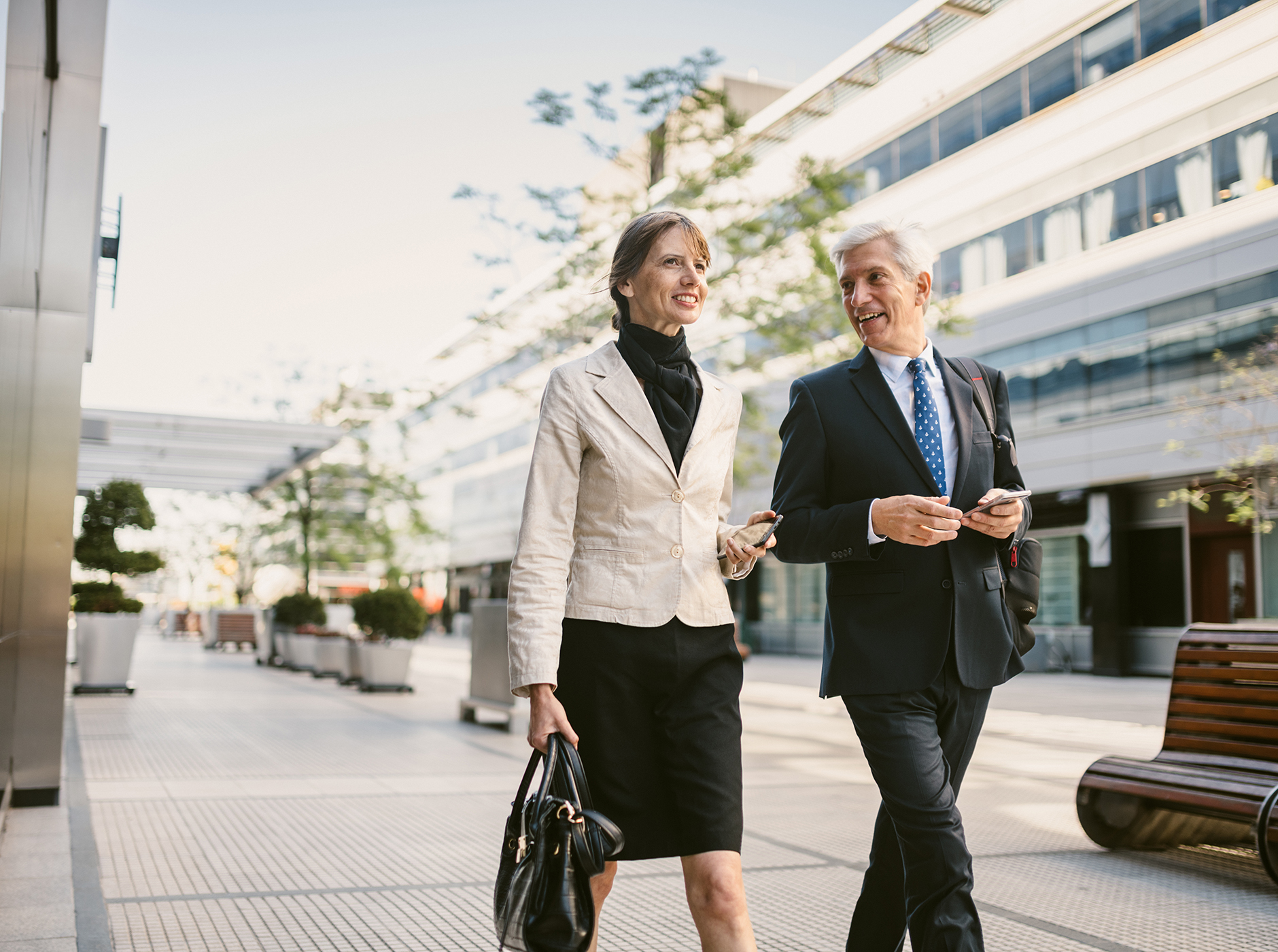 business people walking and talking