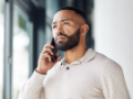 Thinking, serious and businessman talking on a phone call for networking, communication and idea. Listening, focus and employee with a mobile for conversation, discussion and connection at work.